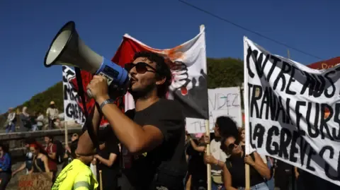 France-Wide Protests Erupt Against Budget Slashing